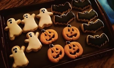 decorated cookies in the shape of ghost and pumpkins Halloween Cookie Spooky Cookies, Fall Board, Fall Room Ideas, Homemade Peanut Butter Cups, black