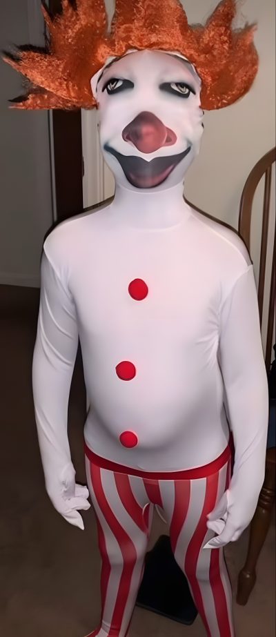 a man dressed as a clown with orange hair and red nose, standing in front of a chair Goofy Ahh Halloween Funny Horror Pics, Halloween Outfit Ideas For Boys, Cursed Outfit, Goofy Horror, dim gray