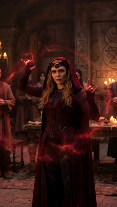 a woman dressed in red and black is standing with her hands out to the side Halloween Wanda Scarlet Witch Mcu, Scarlet Witch Wandavision, Scarlet Marvel, The Scarlet Witch, black