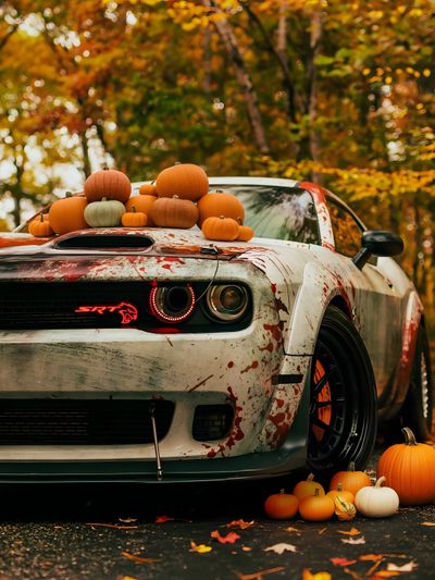 a white car with pumpkins on the hood parked in front of some trees and leaves Halloween Hellcat Dodge Srt Challenger, Muscle Cars Dodge, Mopar Cars, Dodge Muscle Cars, saddle brown