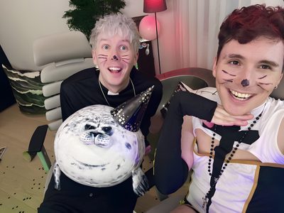 two people with painted faces are posing for the camera Dan And Phil Halloween 2009 Dan And Phil Halloween 2009, Phil Lester 2015, Phil Lester Halloween, gray