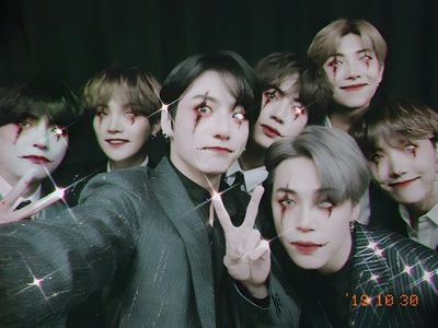 a group of young men standing next to each other in front of a black background Bts Halloween Laptop Bts Halloween Costume, Bt21 Halloween, Bts Happy Halloween, dark slate gray