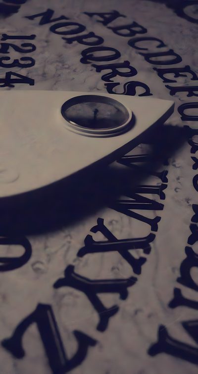 a clock sitting on top of a table covered in letters and numbers that spell out the time Halloween Ouija Planchette Paranormal Aesthetic, Paranormal Pictures, Rapper Iphone, dim gray